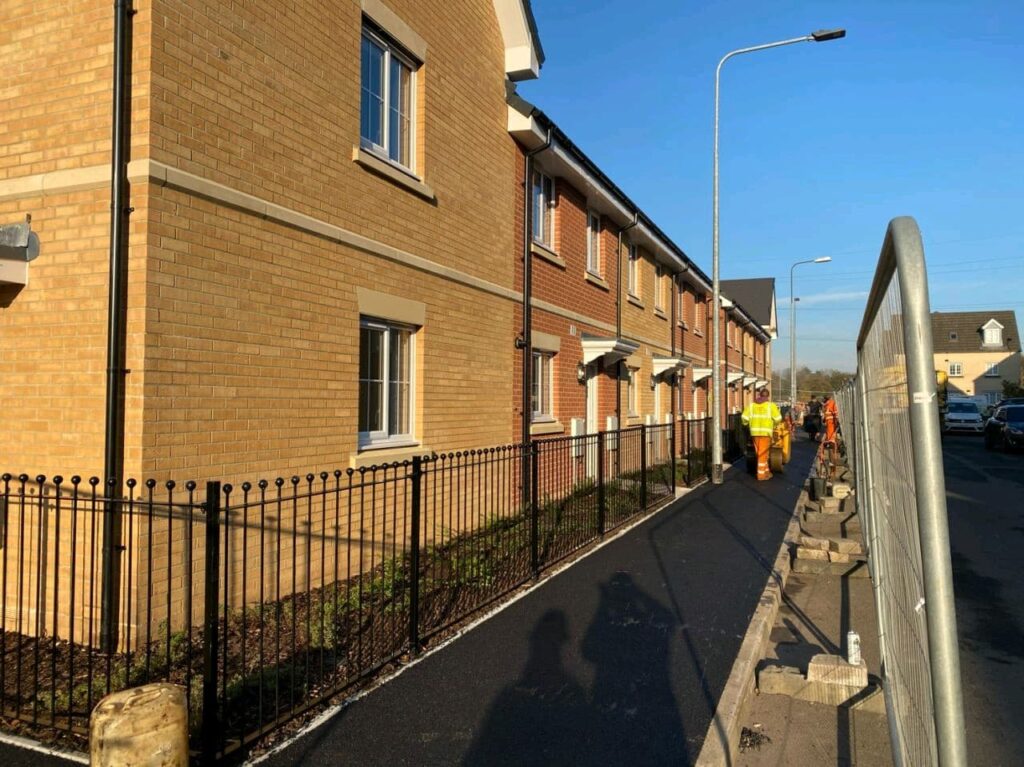 Image shows side of houses